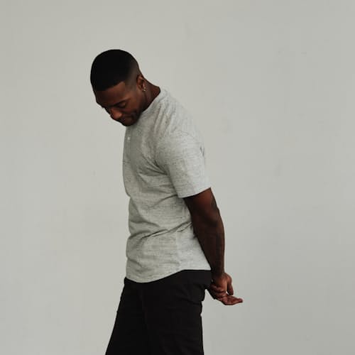 on model image of Textured Short Sleeve Henley