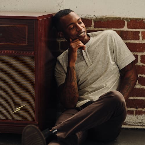 on model image of Textured Short Sleeve Henley