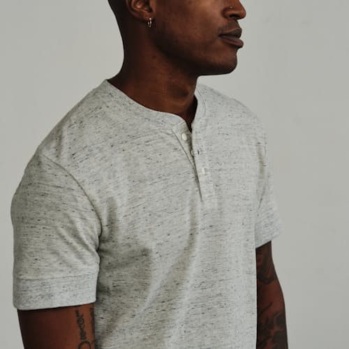 on model image of Textured Short Sleeve Henley