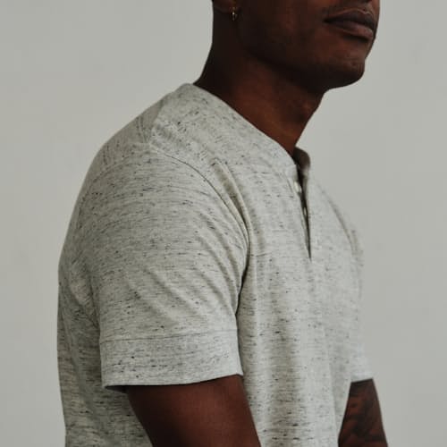 on model image of Textured Short Sleeve Henley