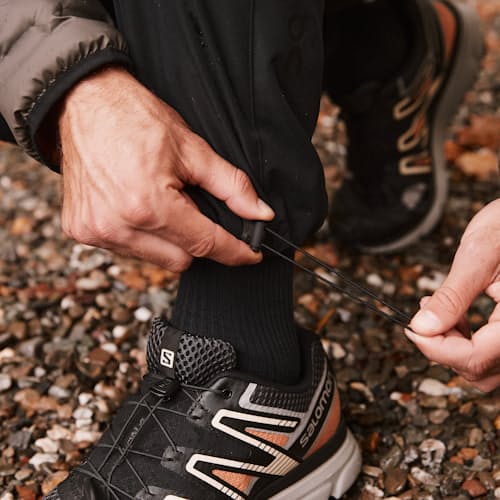 lifestyle image of DWR Explorer Hybrid Pants