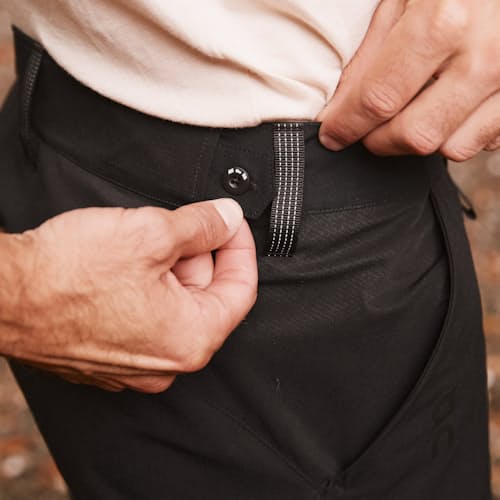 lifestyle image of DWR Explorer Hybrid Pants