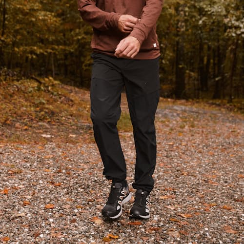 lifestyle image of DWR Explorer Hybrid Pants