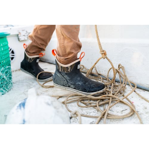 laydown image of Huckberry x Xtratuf Mossy Oak Waterproof Deck Boot