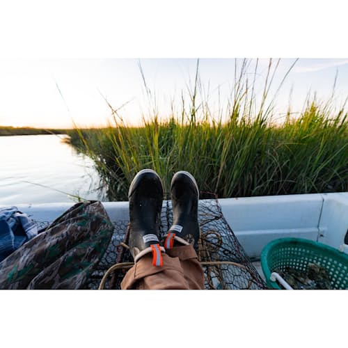 laydown image of Huckberry x Xtratuf Mossy Oak Waterproof Deck Boot