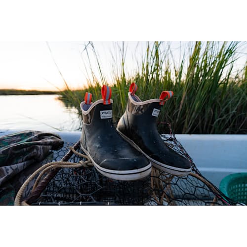 laydown image of Huckberry x Xtratuf Mossy Oak Waterproof Deck Boot