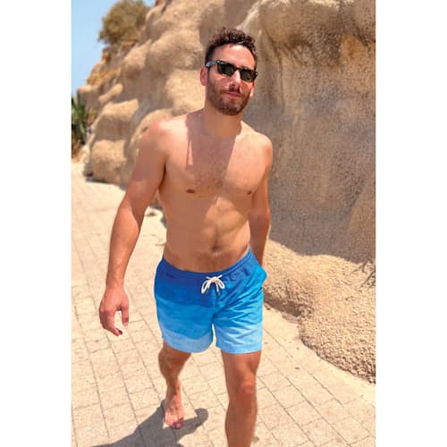lifestyle image of Cerulean Salmon Swim Trunk - 6.3"
