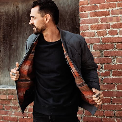 lifestyle image of The Skyliner Waxed Jacket