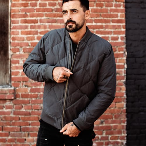 lifestyle image of The Skyliner Waxed Jacket