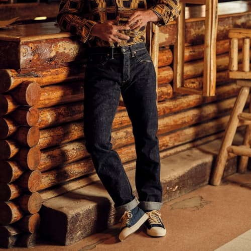 lifestyle image of Slim Fit Selvedge Denim Jeans