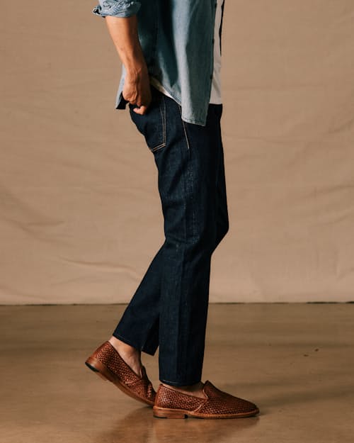 on model image of Slim Fit Selvedge Denim Jeans