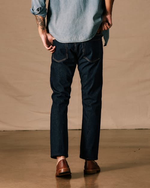 on model image of Slim Fit Selvedge Denim Jeans
