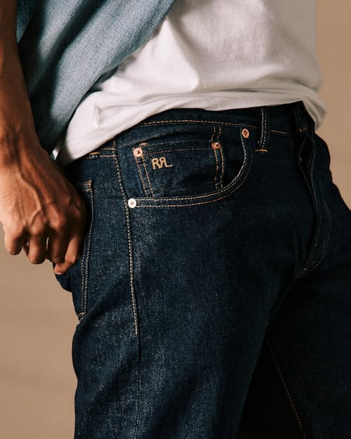 on model image of Slim Fit Selvedge Denim Jeans