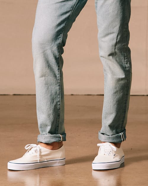 on model image of Slim Fit Selvedge Denim Jeans