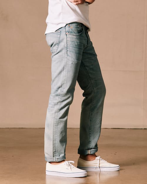 on model image of Slim Fit Selvedge Denim Jeans