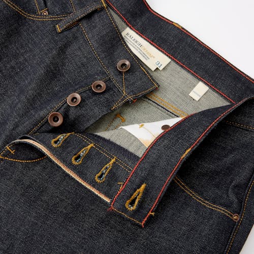 lifestyle image of Graham Relaxed Tapered Denim Jeans