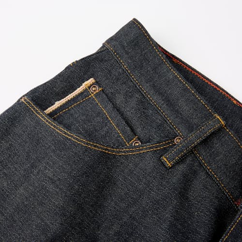 laydown image of Graham Relaxed Tapered Denim Jeans