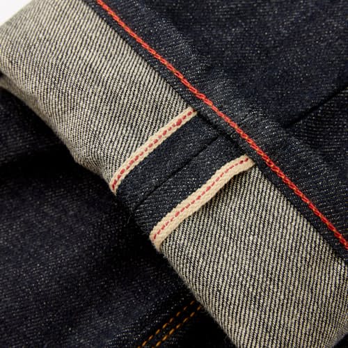 laydown image of Graham Relaxed Tapered Denim Jeans