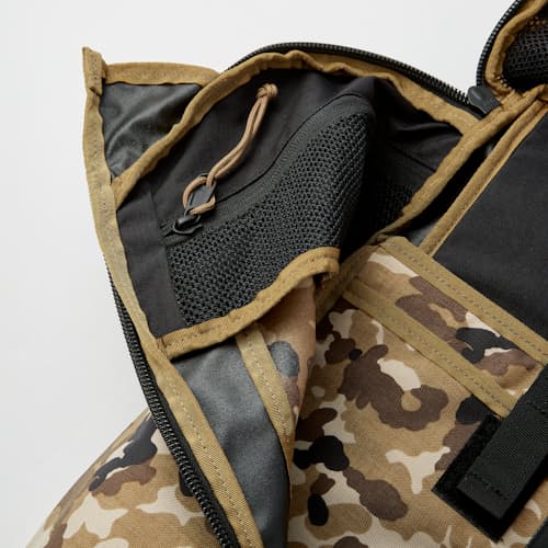 laydown image of Huckberry X Mystery Ranch Urban Assault - 21L Backpack