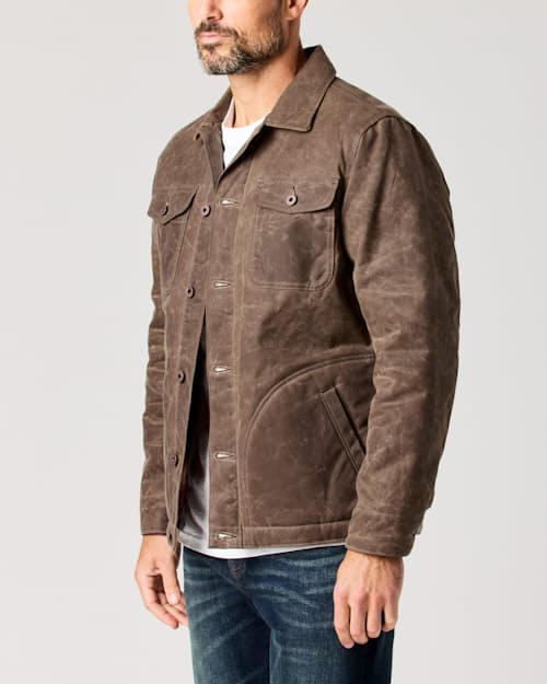 lifestyle image of Flannel-Lined Quilted Waxed Rancher Jacket