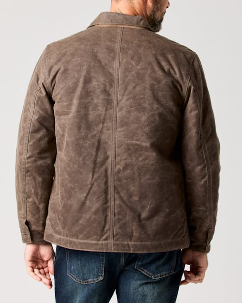 lifestyle image of Flannel-Lined Quilted Waxed Rancher Jacket