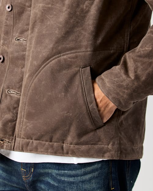 lifestyle image of Flannel-Lined Quilted Waxed Rancher Jacket