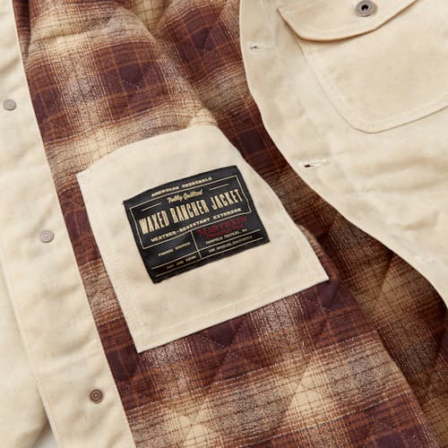 lifestyle image of Flannel-Lined Quilted Waxed Rancher