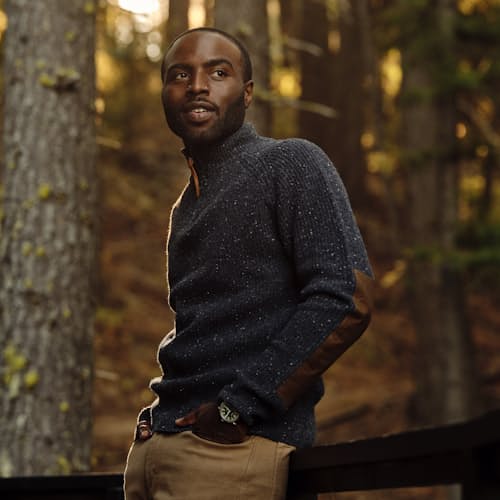 lifestyle image of Highlands Guide Quarter Zip Sweater