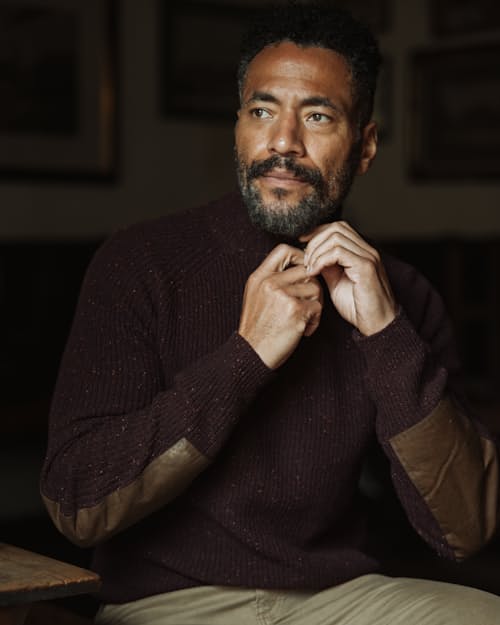 lifestyle image of Highlands Guide Quarter Zip Sweater