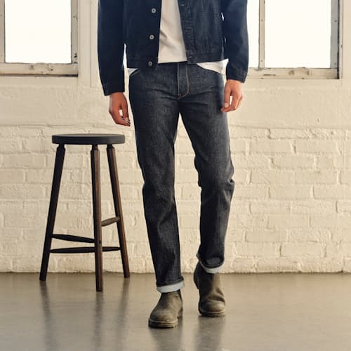 lifestyle image of Jones Slim Straight Denim Jeans