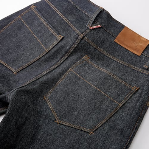 laydown detail image of Jones Slim Straight Denim Jeans