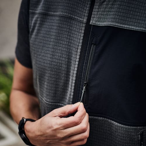 lifestyle image of Trail Grid Fleece Full Zip Vest