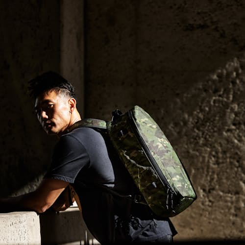 laydown image of Huckberry X The Brown Buffalo Conceal Backpack 21L