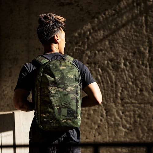 laydown image of Huckberry X The Brown Buffalo Conceal Backpack 21L