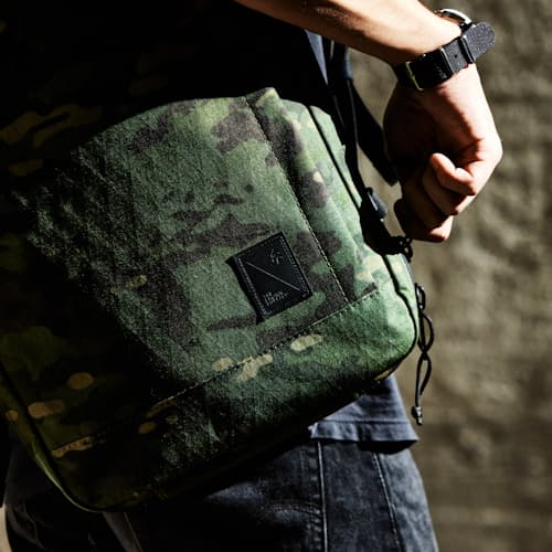 laydown image of Huckberry X The Brown Buffalo Conceal Backpack 21L