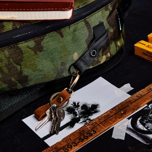 laydown image of Huckberry X The Brown Buffalo Conceal Backpack 21L