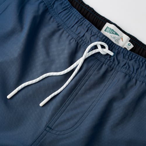 lifestyle image of Performance Lined Swim Trunk - 7"