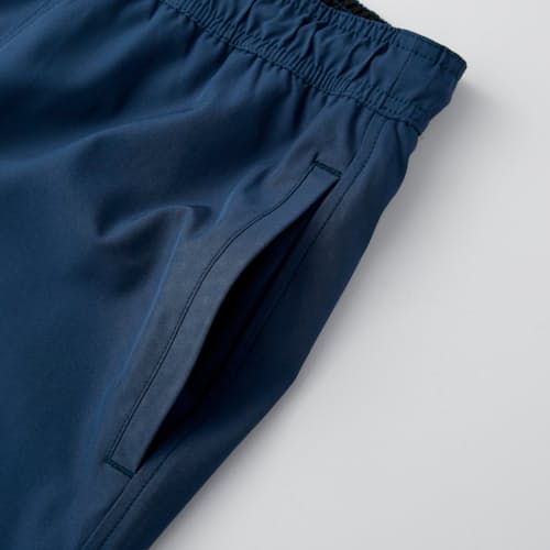 lifestyle image of Performance Lined Swim Trunk - 7"