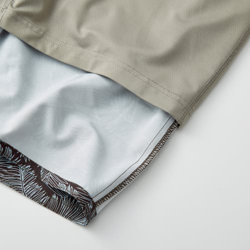 lifestyle image of Performance Lined Swim Trunk - 7"