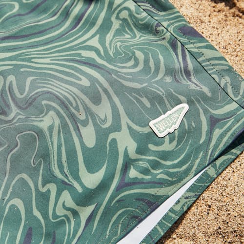 lifestyle image of Performance Lined Swim Trunk - 7"