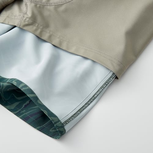lifestyle image of Performance Lined Swim Trunk - 7"
