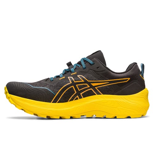 laydown image of Gel Trabuco 11 Trail Running Shoe