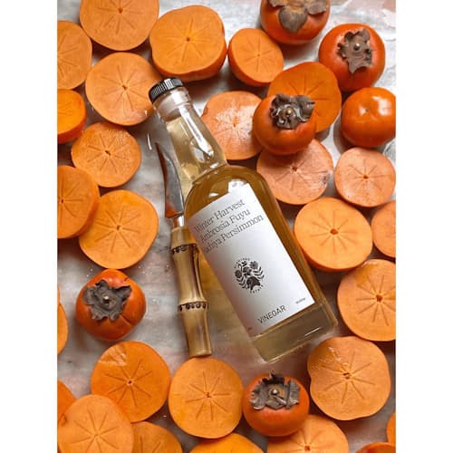 laydown image of Winter Harvest Persimmon Vinegar