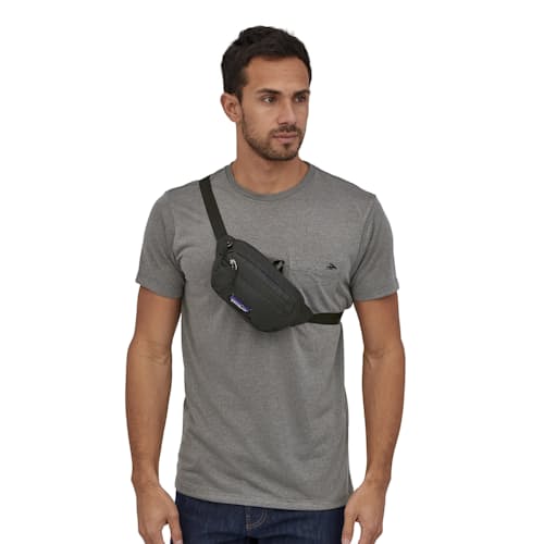 on model image of Ultralight Black Hole Mini Hip Pack - 1L