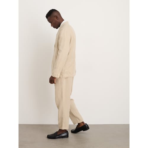 on model image of Mercer Pleated Linen Pant