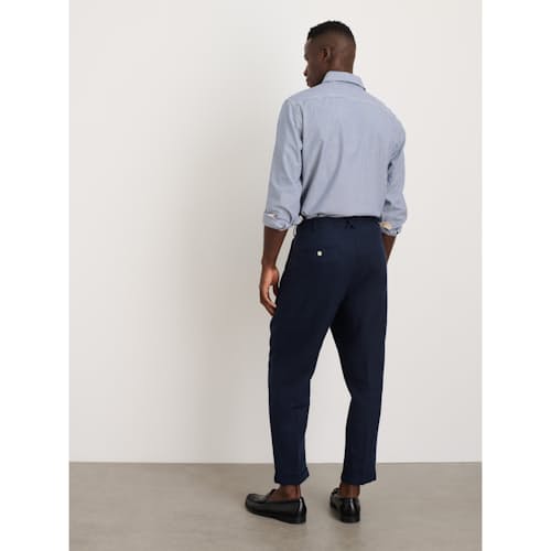 on model image of Mercer Pleated Linen Pant