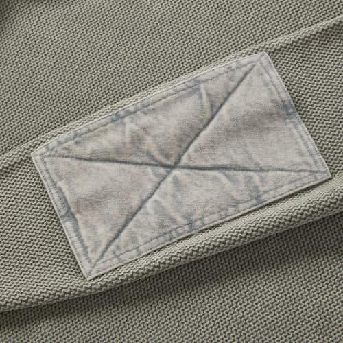 laydown image of The Moor Sweater