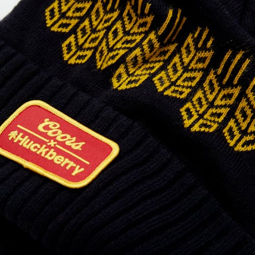 laydown image of Barley Pom Beanie