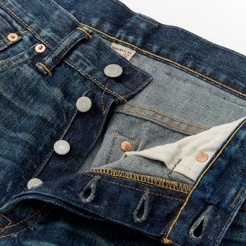 lifestyle image of Slim Fit Selvedge Denim Jeans