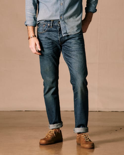 on model image of Slim Fit Selvedge Denim Jeans